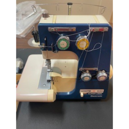 Pre-owned White Superlock 534 Serger